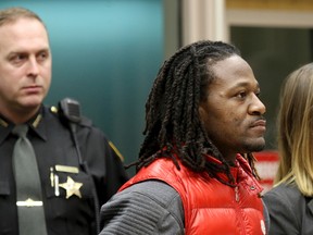 Bengals cornerback Adam "Pacman" Jones is arraigned on Jan. 3, 2017 in Hamilton County Municipal Court, in Cincinatti, after be charged with a felony charge of harassment with a bodily substance. (The Cincinnati Enquirer via AP)