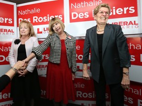 Nathalie Des Rosiers (M) celebrates her Vanier by-election with Madeleine Meilleur (L) and Kathleen Wynne, November 17, 2016. Photo by Jean Levac