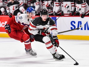 Canadian defenceman Thomas Chabot, a Senators prospect, skates away from Tomas Soustal of the Czech Republic during a world junior quarterfinal on Monday night in Montreal. (Getty Images)