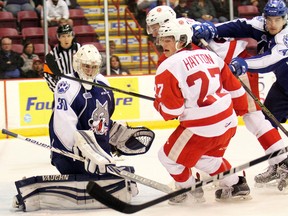 Sudbury Wolves goaltender Jake McGrath, Soo Greyhounds centre Barrett Hayton (27) and Wolves defenceman Aiden Jamieson, watch the puck after it was deflected away during first-period Ontario Hockey League action Wednesday, Oct. 19, 2016 at Essar Centre in Sault Ste. Marie, Ont. JEFFREY OUGLER/SAULT STAR/POSTMEDIA NETWORK