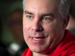 Team Canada head coach Dominique Ducharme talks with reporters at the IIHF world junior championship on Jan. 3, 2017. (THE CANADIAN PRESS/Paul Chiasson)