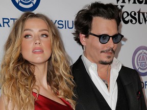 Amber Heard and Johnny Depp attend The Art of Elysium 2016 HEAVEN Gala presented by Vivienne Westwood & Andreas Kronthaler at 3LABS on Jan. 9, 2016 in Culver City, Calif.  (Alison Buck/Getty Images)
