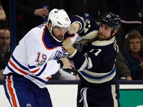 Columbus Blue Jackets forward Brandon Dubinsky fights with Edmonton Oilers forward Patrick Maroon in Columbus, Ohio, Tuesday, Jan. 3, 2017. (AP Photo)