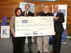 Finlandia SISU Charitable Foundation executive director Patricia Clizia, chair Gerry Lougheed Jr., president Jimmy Krats and CEO David Munch show off the fundraising total of $550,000 at the Finlandia Village Seniors Gym and Wellness Centre on Tuesday. It was announced that more than 700 new members have joined the gym since opening in January 2016.(Gino Donato/Sudbury Star)