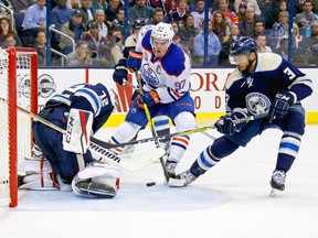 Sergei Bobrovsky of the Columbus Blue Jackets stops a shot by Edmonton Oilers captain Connor McDavid as Jackets teammates Seth Jones looks to clean up the rebound at Nationwide Arena in Columbus, Ohio, on Jan. 3, 2017. Columbus defeated Edmonton 3-1 to win their 16th consecutive game. (Kirk Irwin/Getty Images)