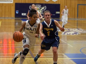 Outstanding NAIT guard Shea-Lynn Noyes drives past Kendal Armstrong of Concordia in recent ACAC action. Both teams will be active this weekend in exhibitions against SAIT and Olds. The Ooks and Thunder will face Medicine Hat and Lethbridge in men’s exhibitions. NAIT coach Todd Warnick will use the female tests as part of preparation for hosting the national women’s championships March 15-18. (Supplied)