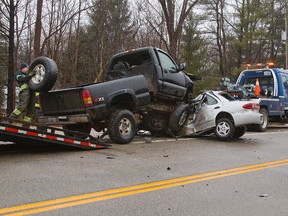 Two-vehicle crash on Longwoods Road on Tuesday January 3, 2017. Middlesex OPP said the vehicles collided on the bend between Dogwood Road and Davis Street in Wardsville, Ontario. (DEREK RUTTAN, The London Free Press)