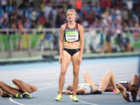 Canada's bronze medal winner Brianne Theisen Eaton catches her breath after the 800-metre of the heptathlon at the Summer Olympics on Aug. 13, 2016 in Rio de Janeiro, Brazil. (THE CANADIAN PRESS/Ryan Remiorz)