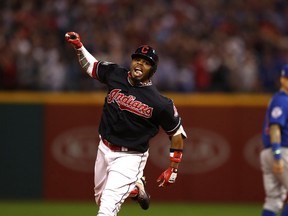 Rajai Davis of the Cleveland Indians celebrates after hitting a home run against the Chicago Cubs in Game 7 of the World Series at Progressive Field on Nov. 2, 2016. (Elsa/Getty Images)