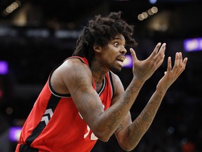 Toronto Raptors centre Lucas Nogueira reacts after he was called for a foul during an NBA game against the San Antonio Spurs on Jan. 3, 2017. (AP Photo/Eric Gay)