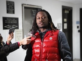 Bengals cornerback Adam "Pacman" Jones speaks to reporters as he is released from the Hamilton County Justice Center after be charged with felony harassment with a bodily substance in Cincinnati on Wednesday, Jan. 4, 2017. (John Minchillo/AP Photo)