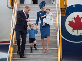 The Duke and Duchess of Cambridge and their children Prince George and Princess Charlotte arrive in Victoria, B.C., on Saturday, September 24, 2016. The RCMP says it spent about $2 million on policing costs during last year's eight-day visit to British Columbia and Yukon by the Duke and Duchess of Cambridge and their two young children. (THE CANADIAN PRESS/Jonathan Hayward)