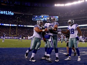 Terrance Williams of the Dallas Cowboys celebrates with teammates after scoring a 31 yard touchdown against the New York Giants during the first quarter of the game at MetLife Stadium on December 11, 2016 in East Rutherford, New Jersey. (Al Bello/Getty Images)