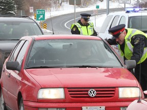 Niagara Regional Police officers conduct at RIDE spot-check in this file photo.