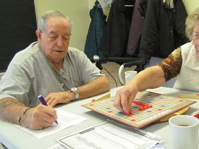 Tom Hurst, left, and Dale Lindemann play Scrabble on Thursday January 5, 2017 at the Strangway Community Centre in Sarnia, Ont. The city-run centre for adults, age 20 and older, located on East Street, is holding an open house Saturday, 10 a.m. to 1 p.m., with tours and demonstrations. (Paul Morden/Sarnia Observer)