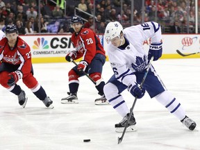 Mitch Marner of the Toronto Maple Leafs skates in front of Karl Alzner of the Washington Capitals during a game at Verizon Center on Jan. 3, 2017. (Patrick Smith/Getty Images)