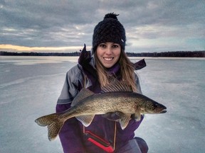 Columnist Ashley Rae with her first walleye of the new ice fishing season. (Supplied photo)