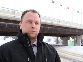 John Lappa/Sudbury Star
Det.-Const. Ryan Johnson, of Greater Sudbury Police, stands near the Bridge of Nations where his quick actions may have saved a young woman's life on Feb. 8, 2016. Johnson plucked the distraught woman from the edge of the Paris Street bridge, grasping her in a bear hug to prevent what could have been a fatal leap.