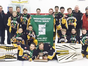 Members of the Mitchell Pee Wees celebrate their Regional Silver Stick championship Dec. 30 in Kincardine. SUBMITTED