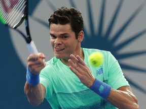 Milos Raonic plays a shot during his match against Diego Schwartzman at the Brisbane International tennis tournament in Brisbane, Australia, on Thursday, Jan. 5, 2017. (Tertius Pickard/AP Photo)