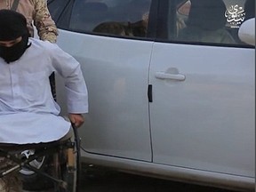 Footage released by a news agency closely aligned with ISIS depicts a wheelchair-bound man carrying out a suicide attack in Mosul. (Screen Capture)