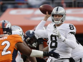 Raiders quarterback Connor Cook gets the nod with Pro Bowler Derek Carr out with a broken leg and backup Matt McGloin nursing a shoulder injury that could make it tough for him to practice enough before Saturday's game at Houston. (Jack Dempsey/AP Photo)