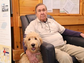 Bill Sundholm, a resident at Finlandia Village, spends time with six-month-old Lily Maija Finn, the resident dog at Finlandia Village in Sudbury, Ont. on Thursday January 5, 2017. Maija is part of a pet therapy program at Finlandia Village. John Lappa/Sudbury Star/Postmedia Network