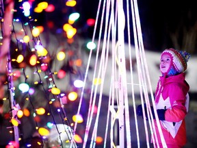 Eight-year-old Sophie Goodale checks out the Sudbury Charities Foundation Festival of Lights at Science North in Sudbury, Ont. on Thursday January 5, 2017. Gino Donato/Sudbury Star/Postmedia Network