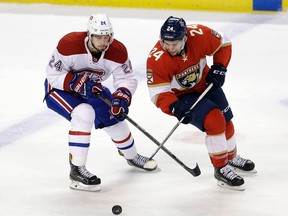 Florida Panthers' Seth Griffith, right, of Wallaceburg and Montreal Canadiens' Phillip Danault battle for the puck during the second period Thursday, Dec. 29, 2016, in Sunrise, Fla. (AP Photo/Alan Diaz)