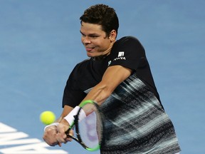 Milos Raonic plays a shot in his quarterfinal match against Rafael Nadal at the Brisbane International tournament in Brisbane, Australia, Friday, Jan. 6, 2017. (AP Photo/Tertius Pickard)