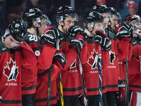 Canada players react to their loss to the United States in the gold medal game at the IIHF World Junior Championship Thursday, January 5, 2017 in Montreal.