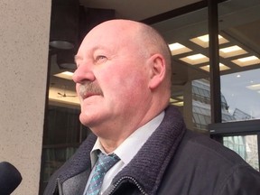 Staff Sgt. Bill Clark outside of the Edmonton Law Courts speaking about the sentence of Nyuk Len Hwang. January, 6 2017