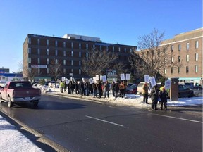 Union protesters in front of Infrastructre Minister Bob Chiarelli's office Friday afternoon. IBEW PHOTO VIA TWITTER