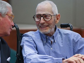 Real estate heir Robert Durst, right, has a lighter moment with his attorney Dick DeGuerin while appearing in a Los Angeles Superior Court Airport Branch for a pre-trial motions hearing Friday, Jan. 6, 2017, in Los Angeles. (Mark Boster/Los Angeles Times via AP, Pool)