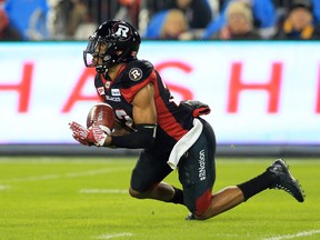 Former Redblack Jeff Richards intercepts the ball during the first half the Grey Cup. Richards has inked a deal with the Carolina Panthers.