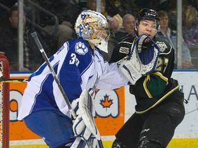 Sudbury Wolves goalie Jake McGrath smacks London Knight Robert Thomas during the first period of their OHL hockey game at Budweiser Gardens in London, Ont. on Saturday January 7, 2017. Derek Ruttan/The London Free Press/Postmedia Network