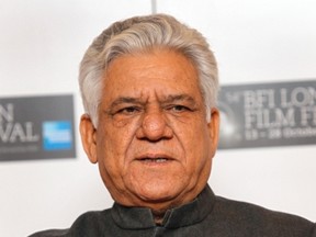 In this Oct. 19, 2010 file photo, Indian actor Om Puri poses during a London Film Festival photocall of West is West, at a central London cinema. Noted Indian character actor Puri died in the western city of Mumbai on Friday, Jan. 6, 2017. In a career spanning more than three decades, Puri had won a slew of national awards and international fame for his work in several critically acclaimed films. He also acted in the British comedy East is East, about the life of a Pakistani immigrant in England and had a small role in Richard Attenborough’s film “Gandhi,” based on the life of the Indian freedom leader Mohandas Gandhi. (AP Photo/Joel Ryan, File)