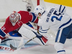Montreal Canadiens goaltender Carey Price makes a save against Toronto Maple Leafs' James van Riemsdyk during first period NHL hockey action in Montreal, Saturday, November 19, 2016. THE CANADIAN PRESS/Graham Hughes