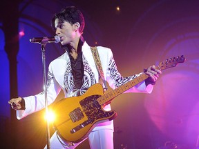 Prince performs on Oct. 11, 2009 at the Grand Palais in Paris. (BERTRAND GUAY/AFP/Getty Images)