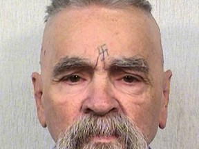 This Oct. 8, 2014 file photo provided by the California Department of Corrections and Rehabilitation shows serial killer Charles Manson. Manson is back in a California prison after a hospital stay for an unspecified medical problem. (California Department of Corrections and Rehabilitation via AP, File)