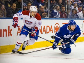 Maple Leafs forward Zach Hyman (right) battles with Canadiens defenceman Alexei Emelin during first period NHL action at the Air Canada Centre in Toronto on Saturday, Jan. 7, 2017. (Ernest Doroszuk/Toronto Sun)