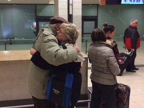 Barbara and Larry Hershorn embrace at the Ottawa airport after her long-overdue arrival from Fort Lauderdale. “I was away on vacation, having a great time. Suddenly, everything changed,” she said. Megan Gillis /Ottawa Sun