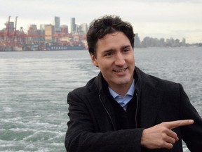 Prime Minister Justin Trudeau is pictured while touring a tugboat in Vancouver Harbour on Dec. 20. (THE CANADIAN PRESS)