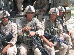 Retired master corporal Collin Fitzgerald, second from right in this 2006 photo, is hosting a series of screenings this week of a film he hopes will help others battling mental health injuries. (Army News file photo)
