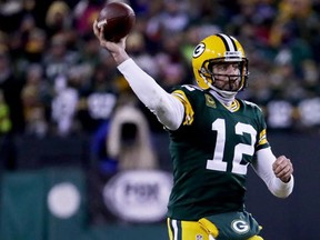 Aaron Rodgers of the Green Bay Packers throws a pass in the fourth quarter during the NFC Wild Card game against the New York Giants at Lambeau Field on January 8, 2017 in Green Bay, Wisconsin. (Jonathan Daniel/Getty Images)