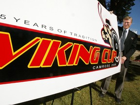 Viking Cup tournament committee chair Verlyn Olson displays the logo in 2006. One year later, it would cease to exist. (File)