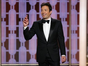 This image released by NBC shows host Jimmy Fallon at the 74th Annual Golden Globe Awards at the Beverly Hilton Hotel in Beverly Hills, Calif., on Sunday, Jan. 8, 2017. (Paul Drinkwater/NBC via AP)