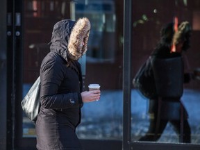 Pedestrians in the Byward Market on a cold winter day.