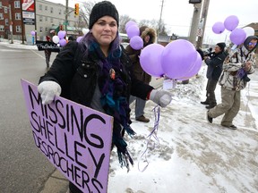 Supporters of missing London woman Shelley Desrochers march down Hamilton road on Thursday, Jan. 5. The group walked along the London street, one of the last places Desrochers was seen before she disappeared a year ago, and launched balloons. A tip line has been set up to gather information about Desrochers. Anyone with information about her disappearance is asked to call 519-660-5842. (MORRIS LAMONT, The London Free Press)