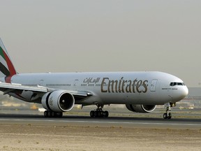 A U.S.-made Boeing 777-300ER, owned by Dubai carrier Emirates, takes off from Dubai airport in this July 29, 2008 file photo. (MARWAN NAAMANI/AFP/Getty Images)